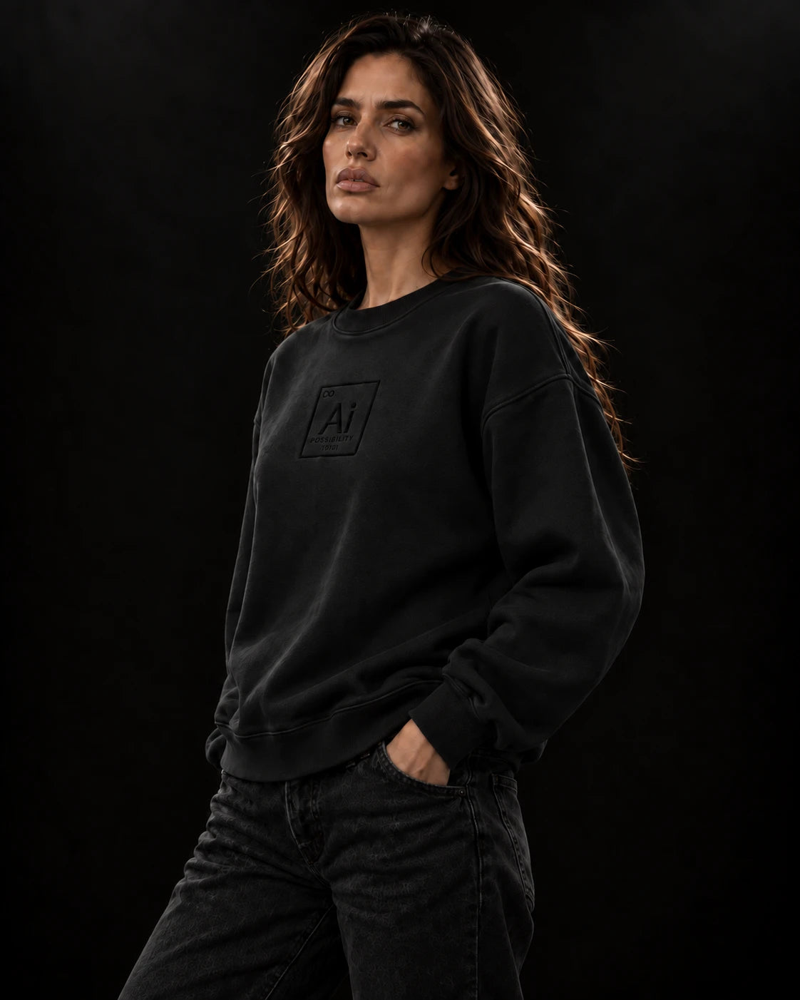 Model in the Possibility Crewneck in washed black, hand in pocket, dark studio